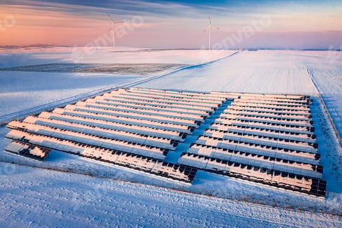 Preview: Snowy solar panels in winter. Alternative energy in winter.