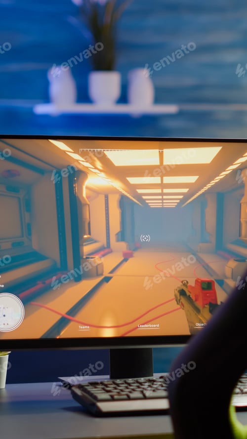 Preview: RGB powerful computer gamer rig with FPS videogame on screen