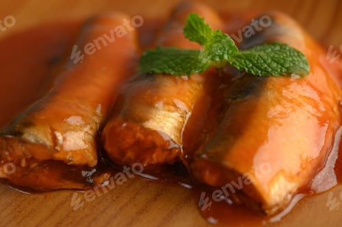 Preview: Appetizers salad of sardine in tomato sauce on wooden tray