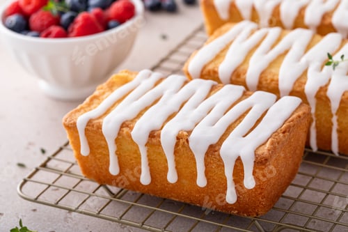 Preview: Classic pound cake with powdered sugar glaze dripping over