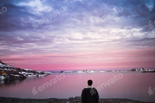 Preview: Solitude at sunset A serene moment by the lakeside.