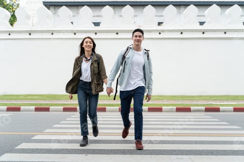 Preview: Asian attractive romantic couple travel in the city for honeymoon trip.