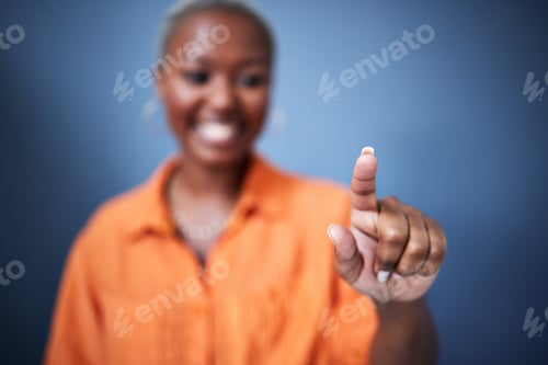 Preview: Finger, security and black woman user in studio on blue background for internet browsing or access