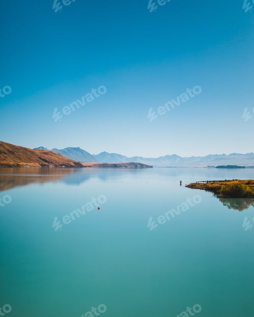 Preview: Vertical shot of the Lake Pukaki and Mount Cook in New Zealand
