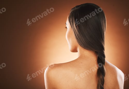 Preview: Woman, back or hair style on orange background in studio in keratin treatment marketing, balayage g