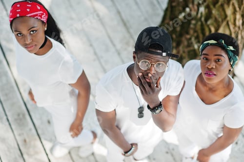 Preview: Stylish african american friends in white