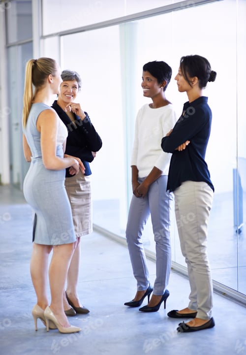 Preview: Shot of a group of business colleagues having a conversation in the office
