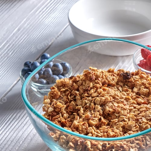 Preview: Organic homemade Granola Cereal with oats and fresh berries. Texture oatmeal granola or muesli in
