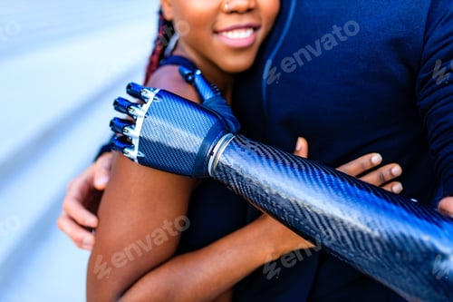 Preview: mixer-race couple in love embrace in each other's arms outdoors