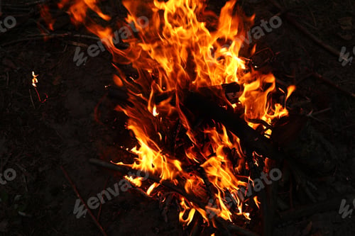 Preview: Fire flames on black background. The fire in the natural forest, flames and sparks on a dark