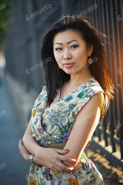 Preview: Beautiful Asian Woman Posing Outdoors