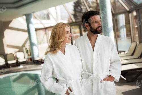 Preview: Portrait of attractive couple in spa center