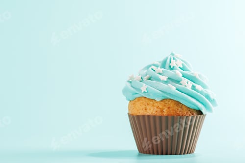 Preview: Delicious Cupcake with Blue Frosting and Star Sprinkles