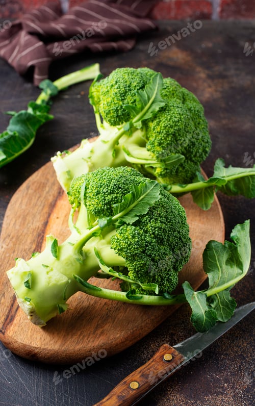 Broccoli Crowns on Wooden Cutting Board Still Life