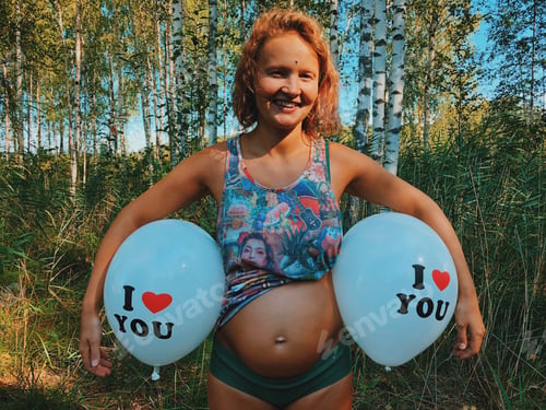 Preview: Woman Holds Balloons in Forested Outdoor Setting