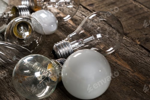 Preview: Lightbulbs on wooden background