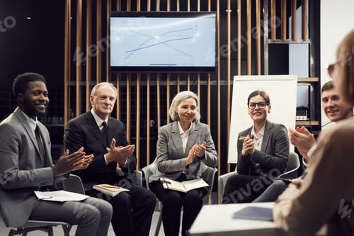 Preview: Small group of business people at course