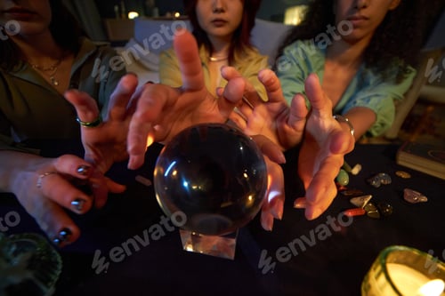 Preview: Hands Of Young Women Using Crystal Ball
