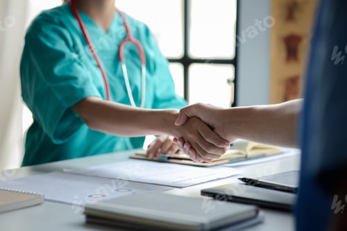 Preview: Conference room in the hospital, a group of doctors attending a handshake meeting.