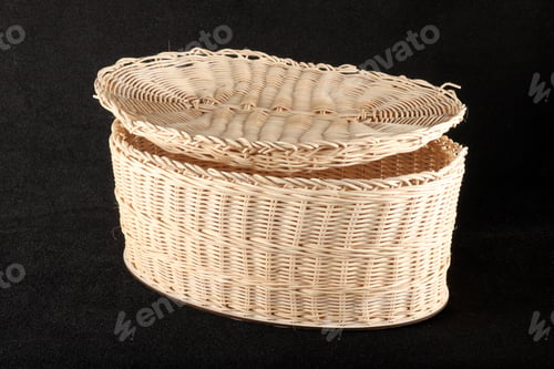 Preview: Knitted basket with lid on black background