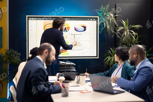 Preview: Marketing manager evaluating sales and profit within infographics data