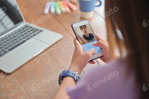Preview: Young women video calling with lovers on a smartphone.