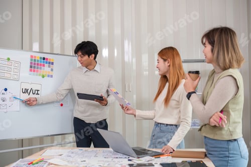 Preview: Creative team of designers in application design and ux ui usability planning. Modern business team