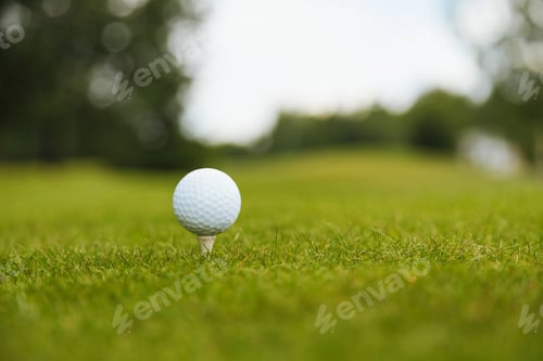 Preview: golf ball on tee ready to play