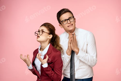 Preview: business man and woman emotion officials pink background