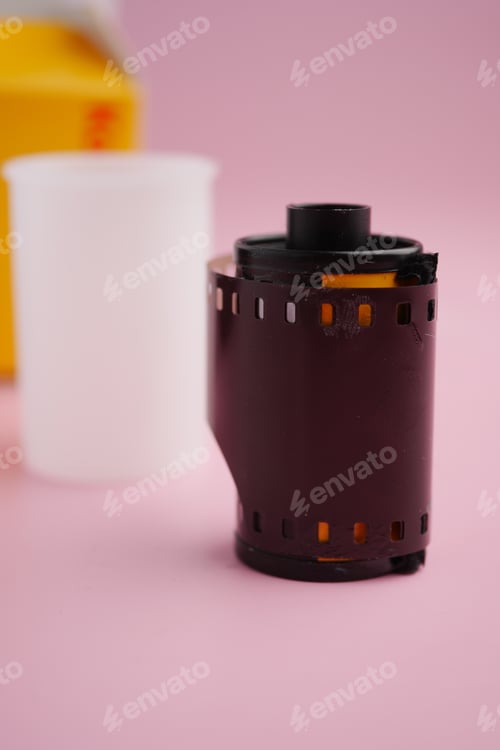 Preview: Vintage film roll on a simple pink background