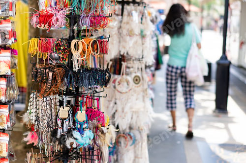 Preview: Bracelets showcased in storefront window display.