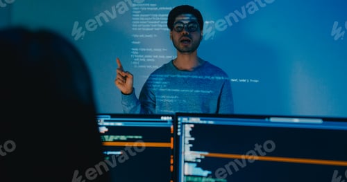 Preview: Group adult Asia male software developers mentor leader manager talk strategy plan to executive.