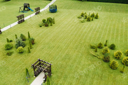 Preview: top view of a green lawn with Seating areas and a garden.Landscape area of the site