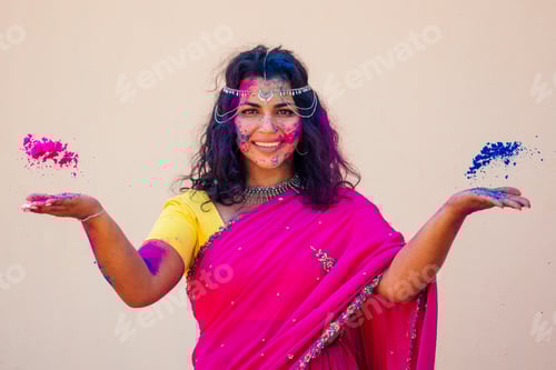 Preview: Holi Festival Of Colours. Portrait of happy indian girl in traditional hindu sari