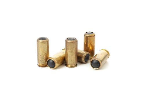 Preview: Rubber bullets isolated on white background. Self defense weapon