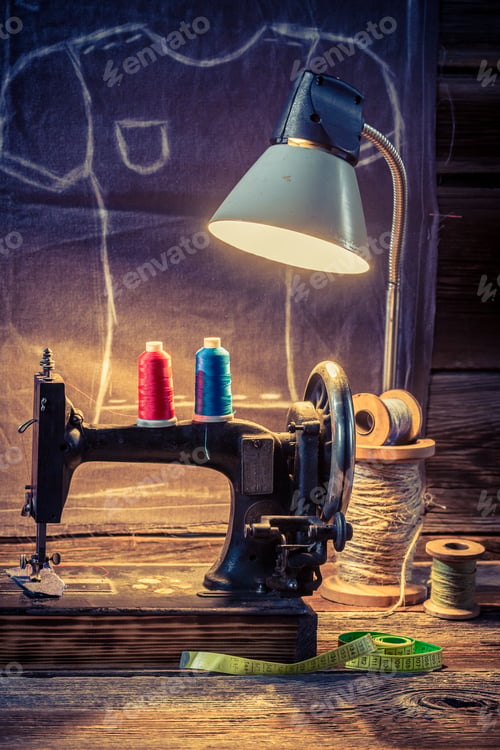 Preview: Tailor workshop with sewing machine and cloth