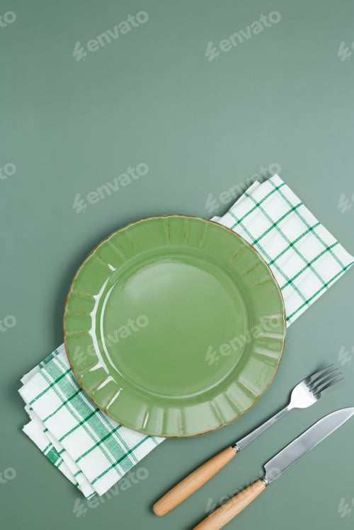 Preview: Dinner plate setting with cutlery, napkin and glass. Top view, copy space, flat lay