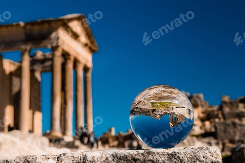 Preview: Famous Dougga archaeological site in the abstract misrepresentation of a glass ball