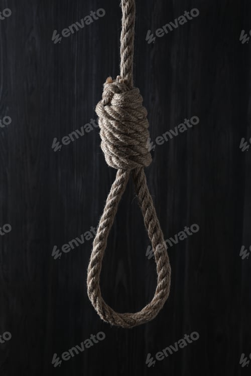 Preview: Tied rope noose against dark wooden background