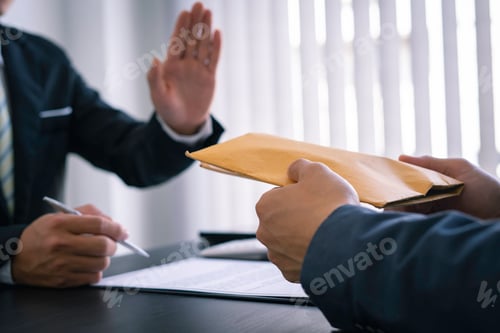 Preview: Businessman or accountant is rejecting and resisting partner bribery deals in joint financial settle
