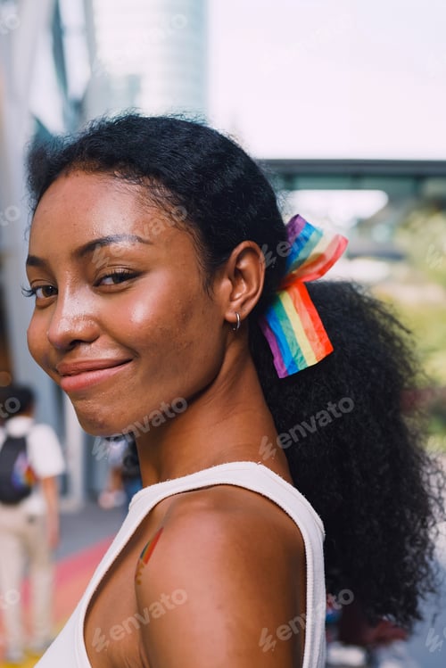 Preview: A young black woman shows off her homosexual identity in a pride parade.