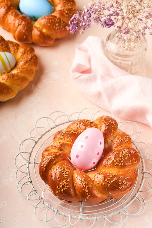 Preview: Spanish Easter cake. Traditional mona de pascua typical in Spain with boiled eggs eaten inside on pi