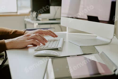 Preview: Unrecognizable Person Texting On Computer In Office
