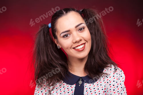 Preview: Portrait of beautiful woman smiling and looking at the camera