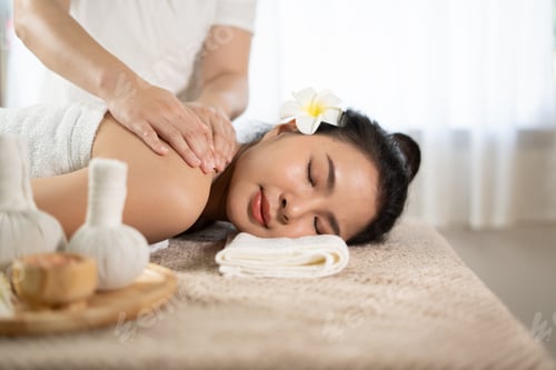 Preview: Young Asian beauty woman enjoying massage and spa.