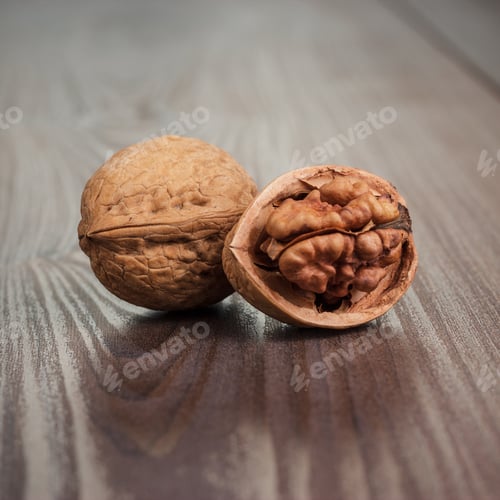 Preview: Walnuts On The Brown Wooden Table