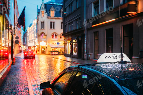 Preview: Taxi Car Wait Clients In Old European Streets In Rainy Evening.