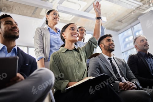 Preview: Shot of a group of business people asking questions during a conference