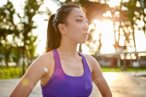 Preview: Woman wearing crop top looking away