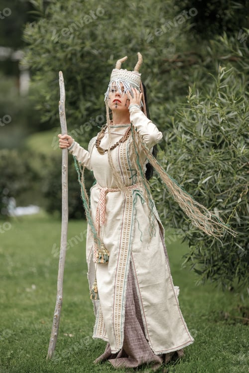 Preview: Beautiful girl in ethnic Karelian costume in nature